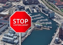 Luftfoto af Kalkbrænderihavnen og Sejlklubben København med stopskilt